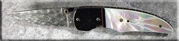 KTM002c-dam-pearl-folder-solo.jpg
